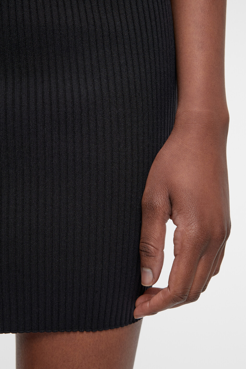 Юбка-чулок мини вязаная облегающая в рубчик - цвет черный - 5