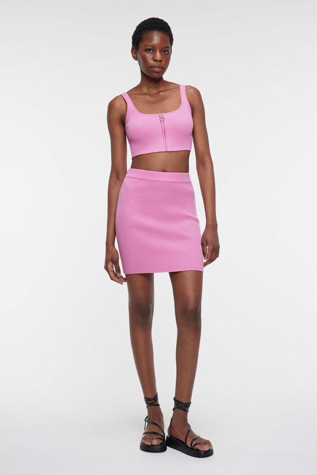 Юбка-чулок мини вязаная облегающая в рубчик - цвет розовый - 4