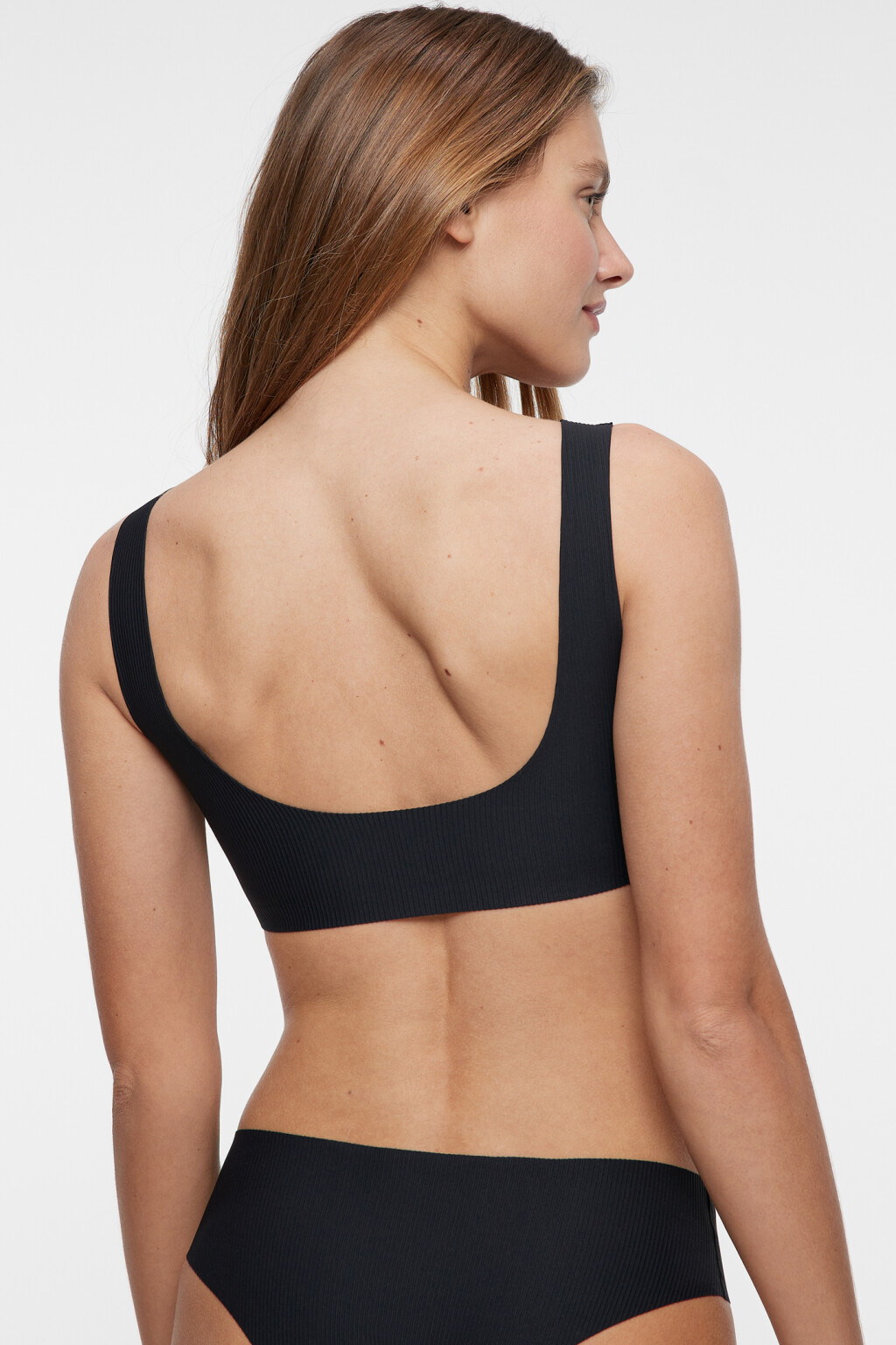 Бюстгальтер-топ спортивный бесшовный в рубчик - цвет черный - 3