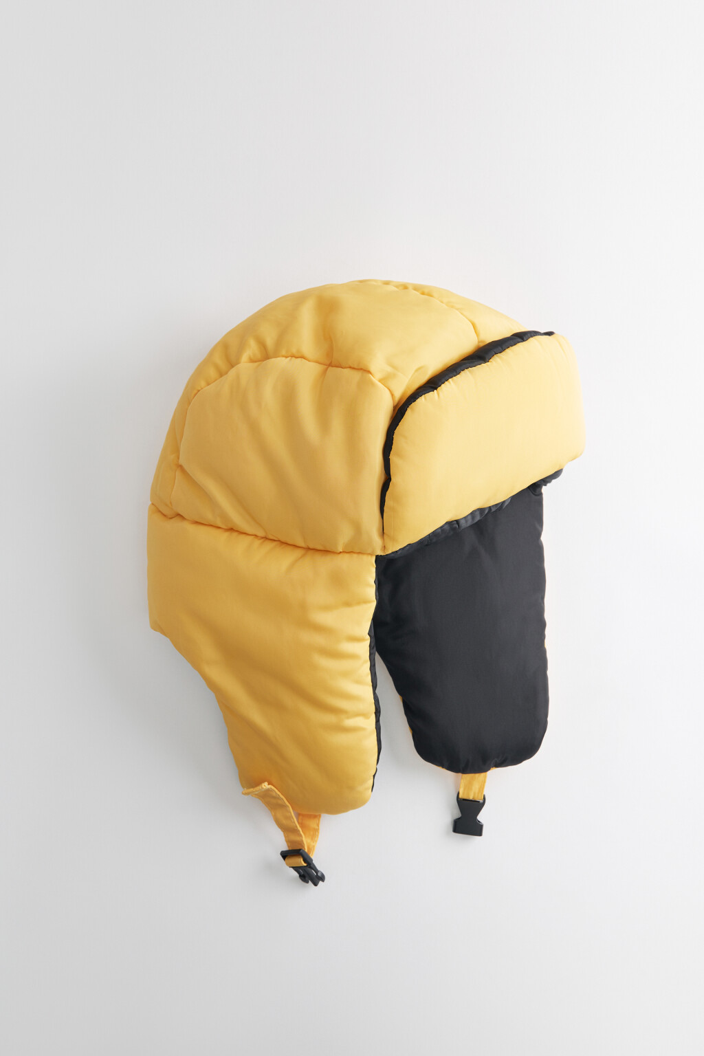 Шапка-ушанка стеганая утепленная с застежкой - цвет желтый - 2