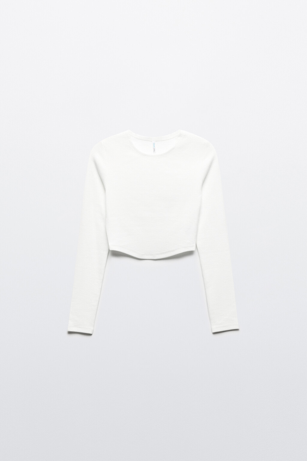 Лонгслив в рубчик укороченный с фигурным низом - цвет белый - 9