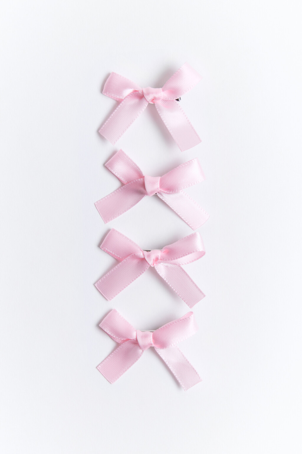 Набор заколок-зажимов с бантиками (4 штуки) - цвет розовый - 1