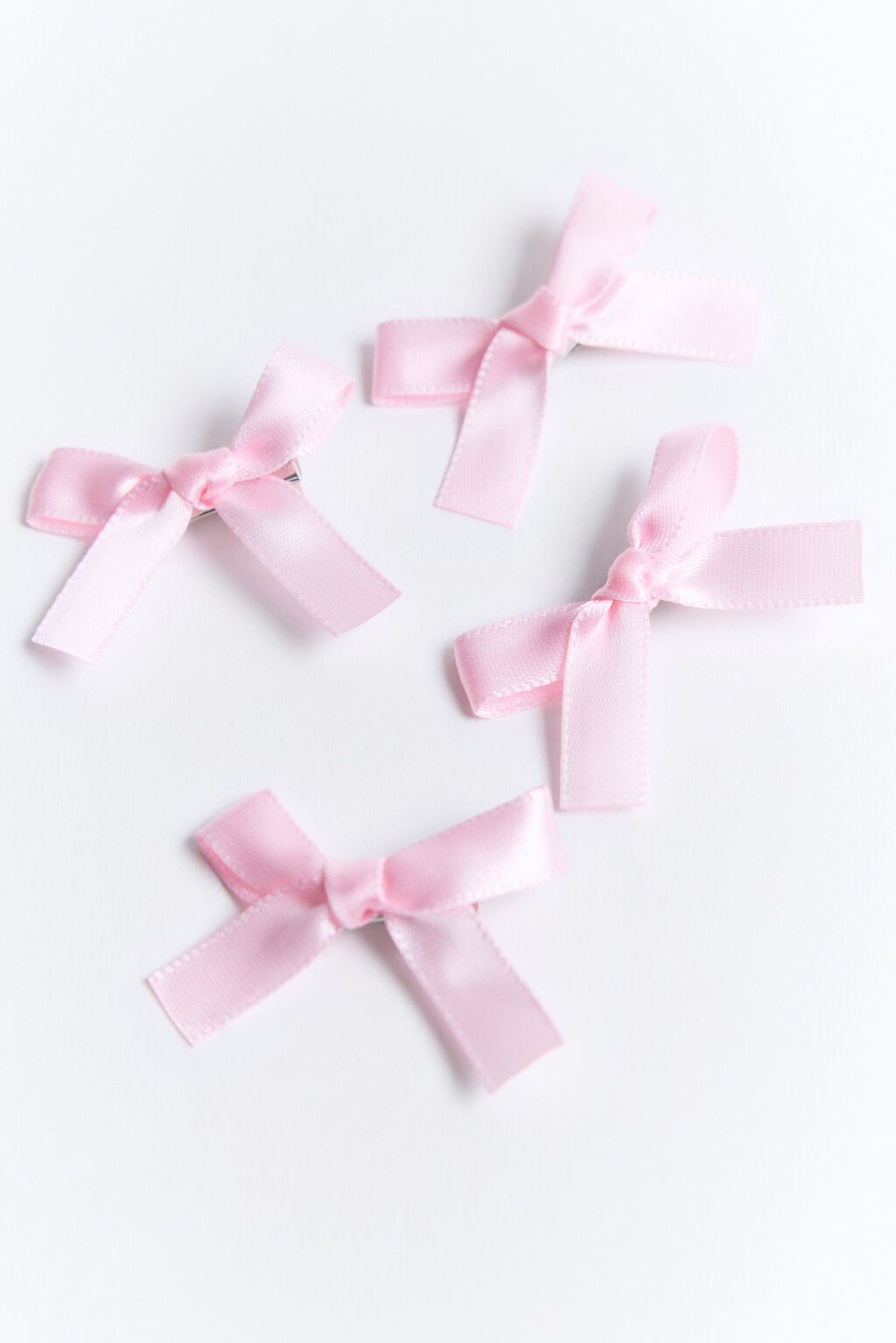 Набор заколок-зажимов с бантиками (4 штуки) - цвет розовый - 2