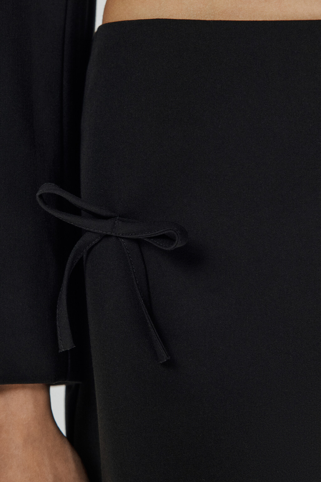 Юбка мини костюмная с бантиками - цвет черный - 6