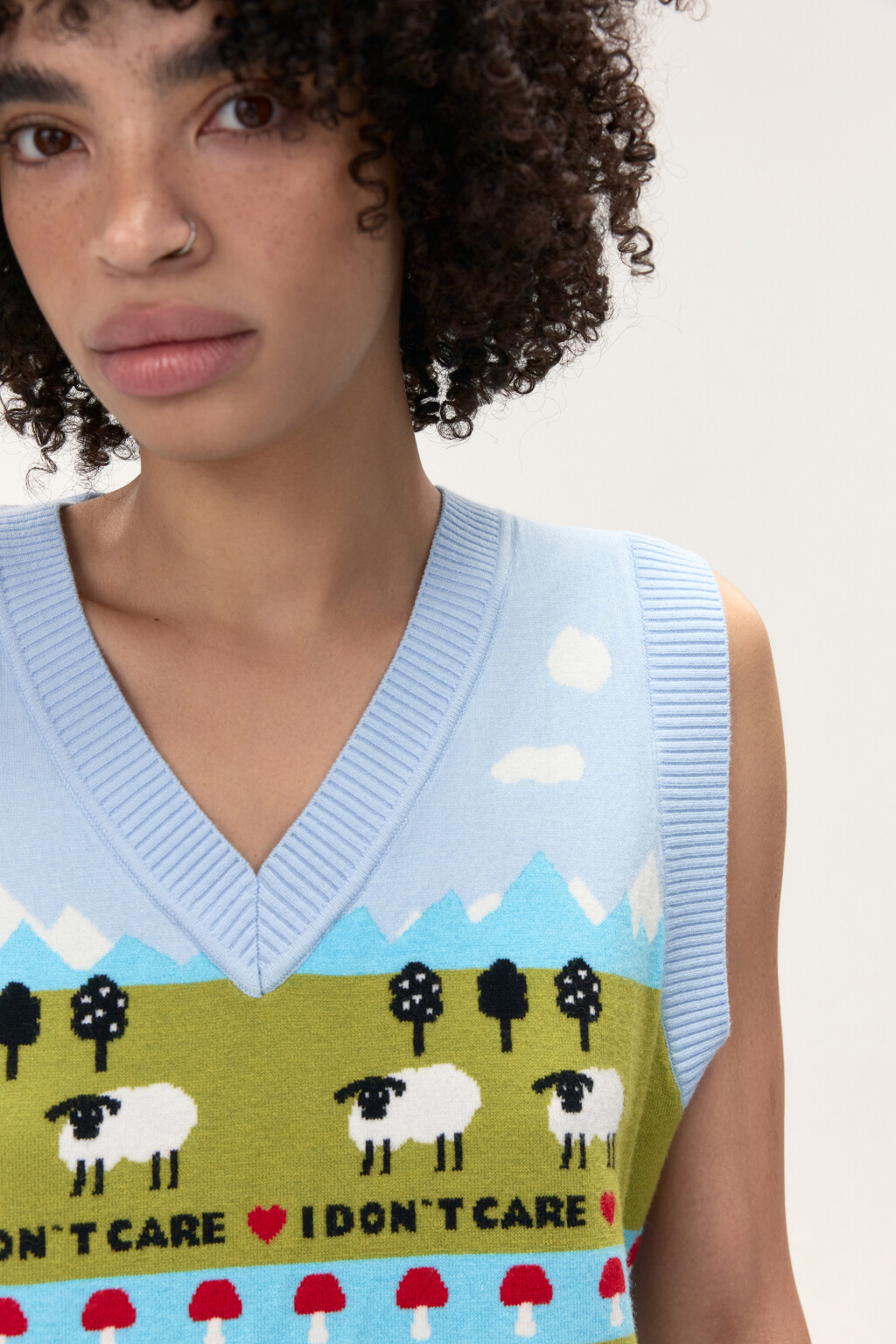 Жилет вязаный с рисунком - цвет голубой - 7