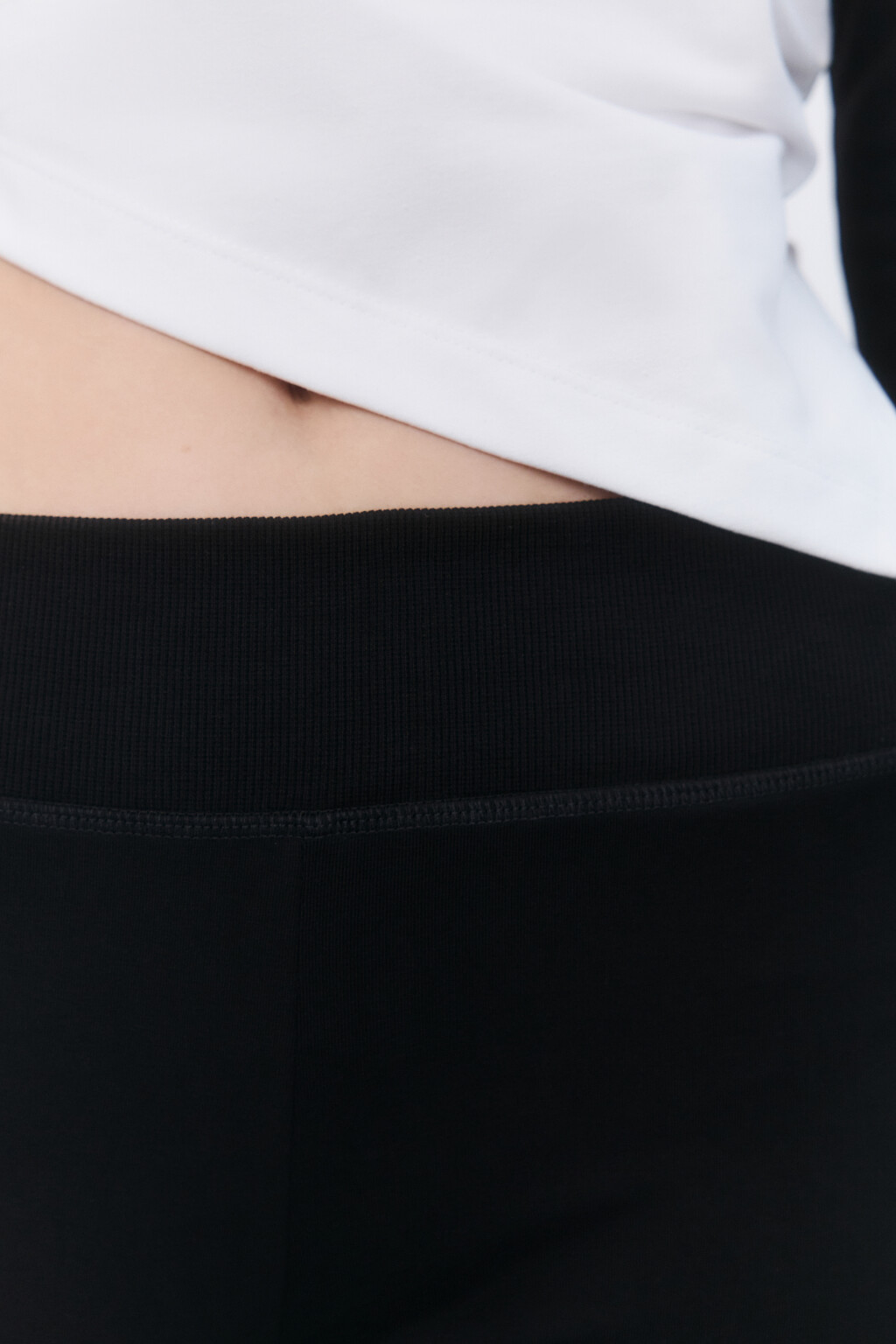 Брюки клеш трикотажные - цвет черный - 5
