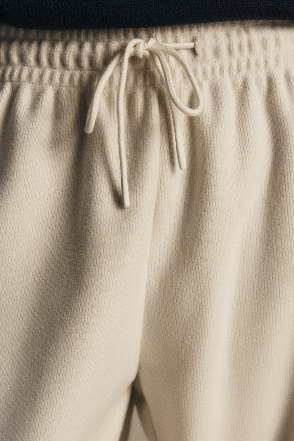 Брюки из теплого трикотажа - цвет молочный - 6