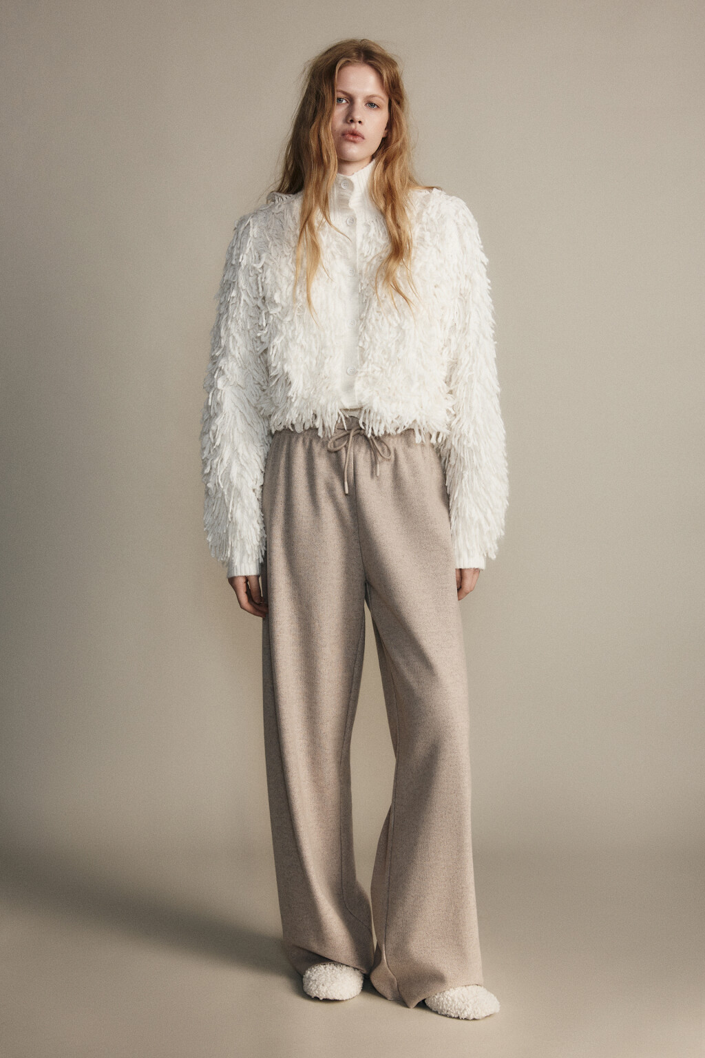 Брюки из теплого трикотажа - цвет бежевый - 4