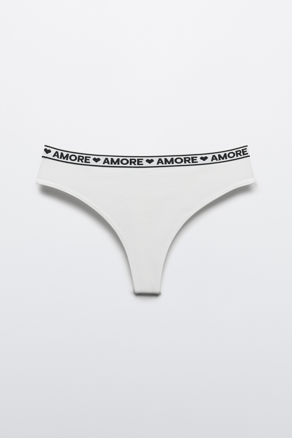 Трусы-стринги в рубчик с надписью - цвет белый - 1