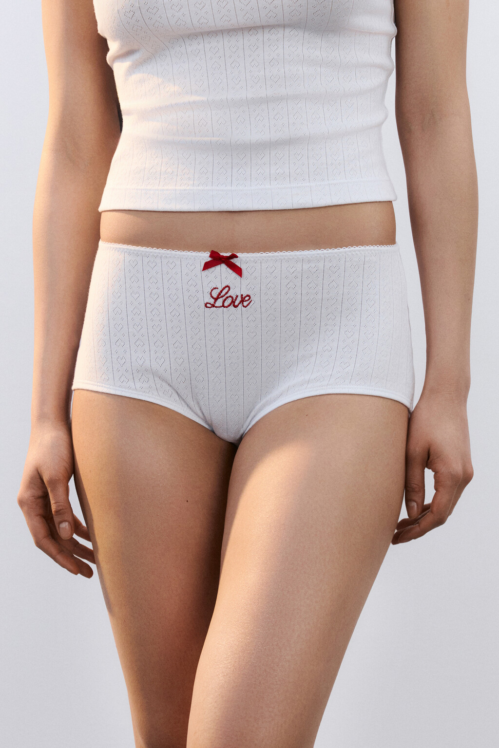 Трусы-шортики в рубчик с бантиком - цвет белый - 2