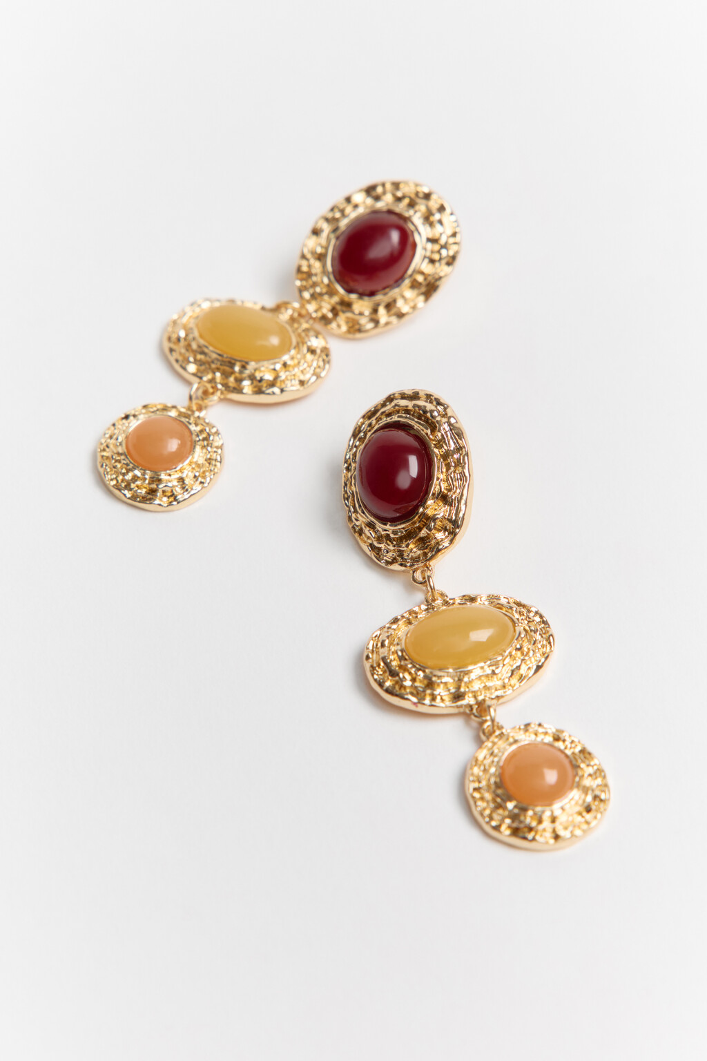 Серьги-гвоздики золотистые с искусственными камнями - цвет желтый - 2