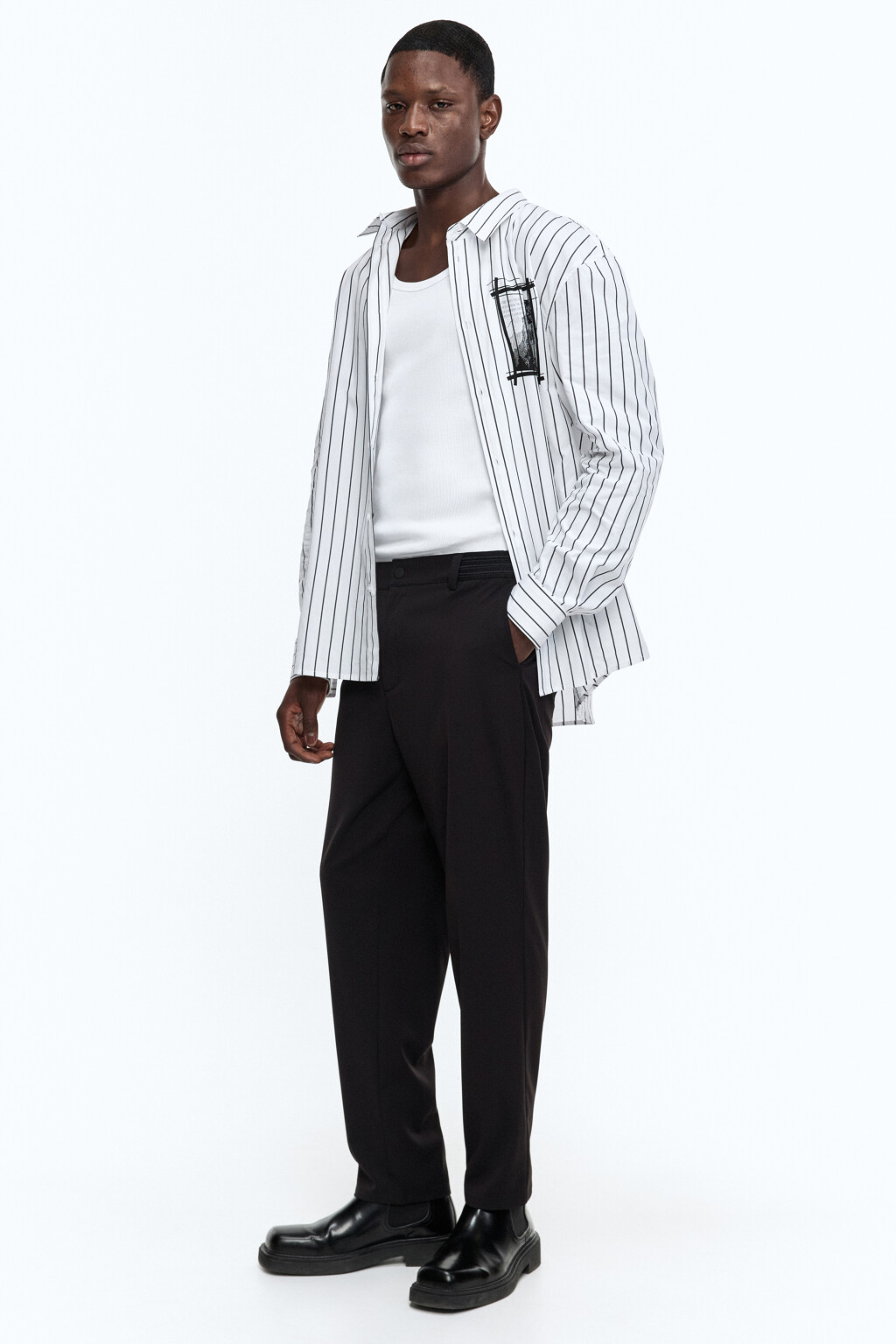 Брюки зауженные из костюмной ткани - цвет черный - 1