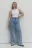 Джинсы-трубы wide leg заниженные с оторванным карманом - цвет голубой - 7