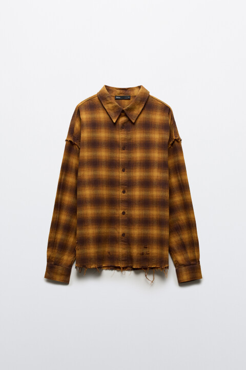 Рубашка в клетку с открытыми срезами