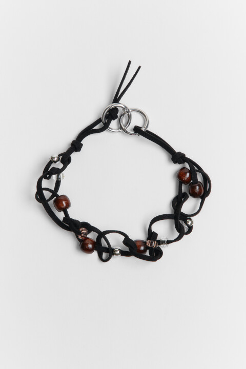 

Колье-шнурок плетеное с бусинами, Серый, Колье-шнурок плетеное с бусинами